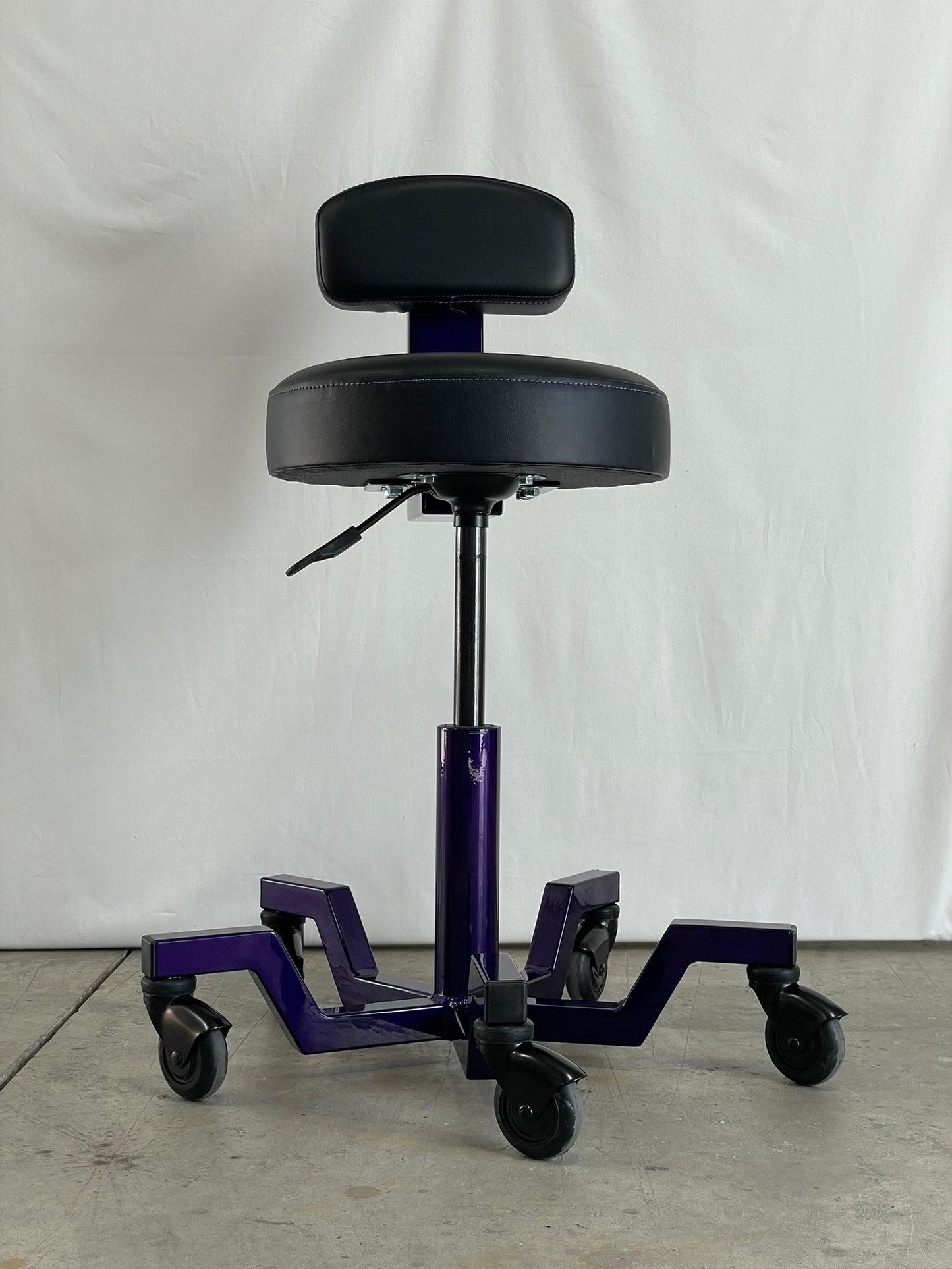 Purple stool with backrest