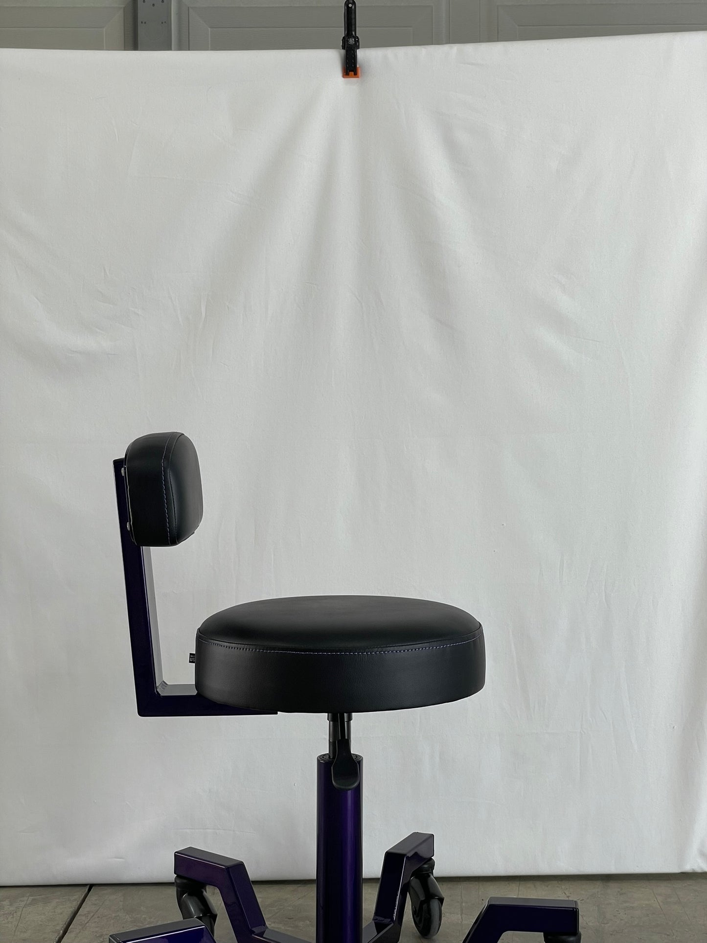 Purple stool with backrest