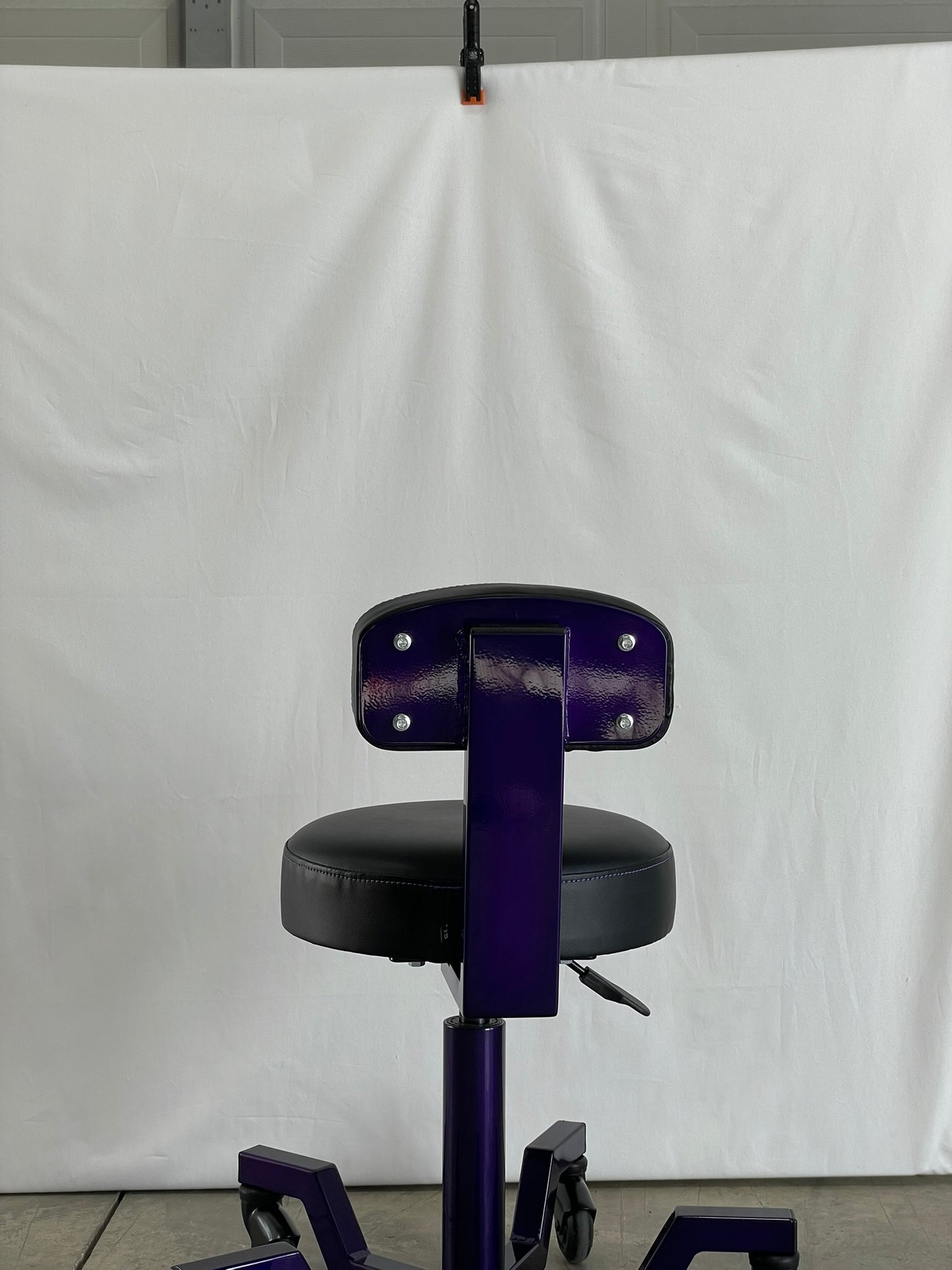 Purple stool with backrest